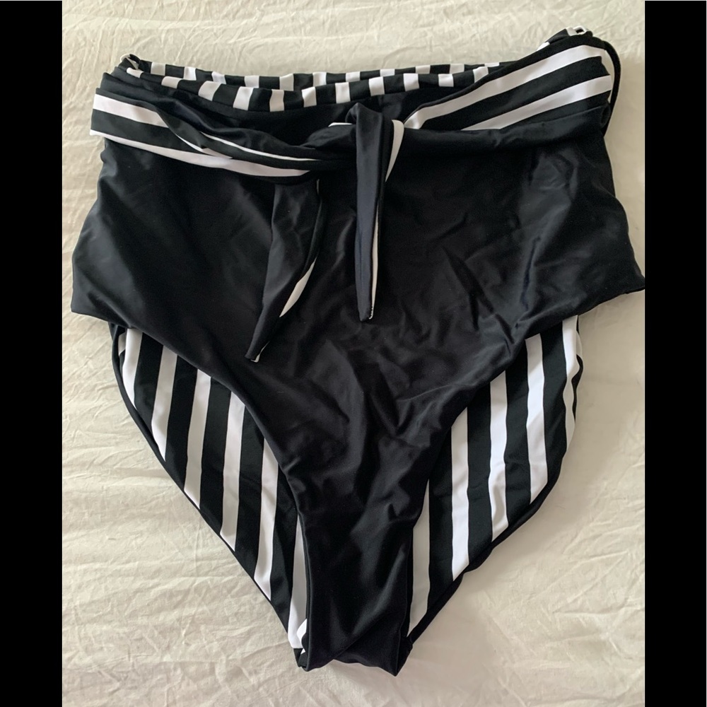 New size large coral reef reversible swim bottoms black or striped with belt.